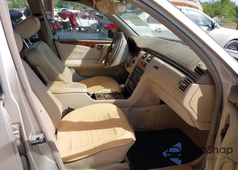 1999 Mercedes-Benz E 320 из США, поврежденный, VIN WDBJH65F3XA845635